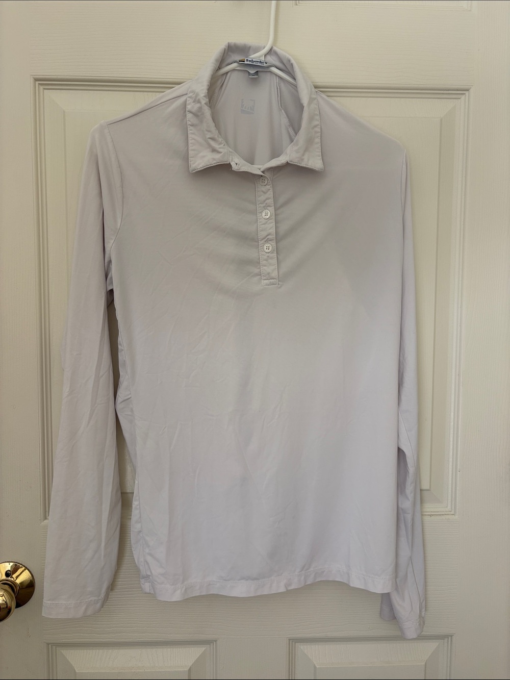 Solumbra women’s Medium White SPF long sleeve shirt.